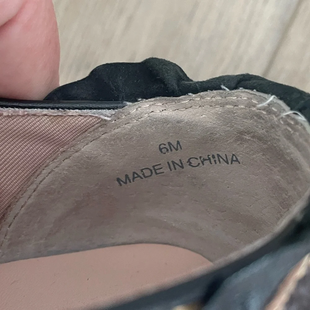 Kate Spade Black and Tan Slip-On Shoes